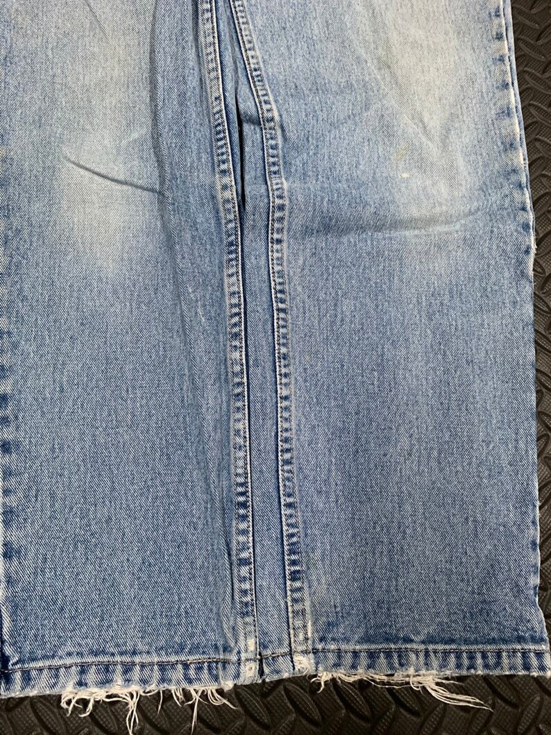 Vintage 90s Relaxed Fit Medium Wash High Waisted Jeans