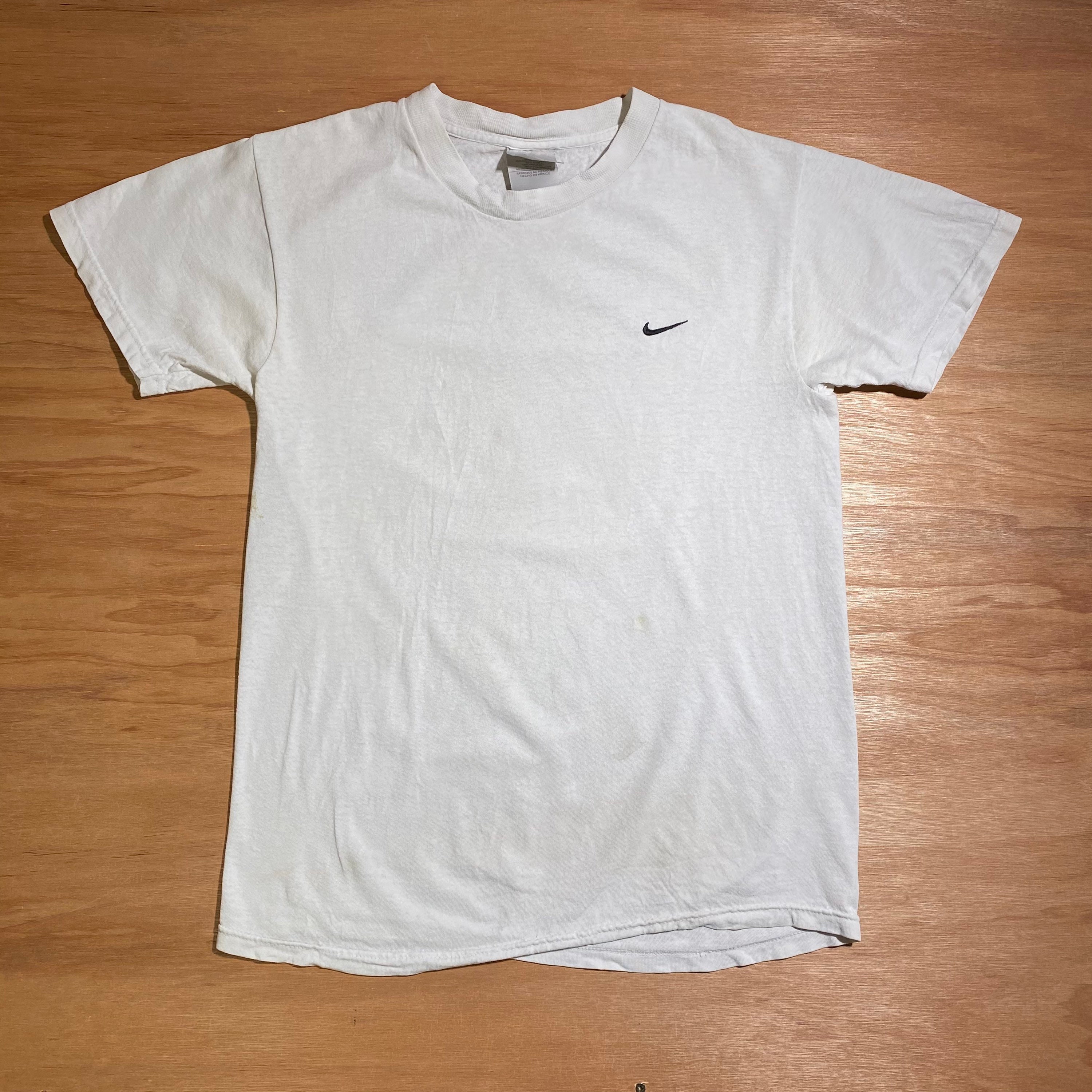 stacking checks nike shirt