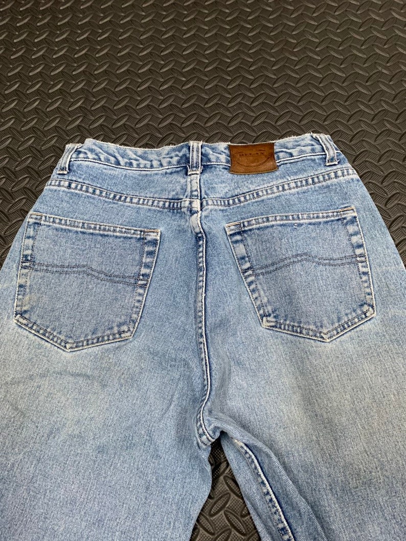 Vintage 90s Relaxed Fit Medium Wash High Waisted Jeans