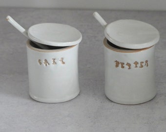 Ceramic set of Salt And Pepper Dishes with spoons