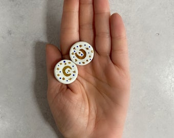 Porcelain gold luster stud earrings , gold moon