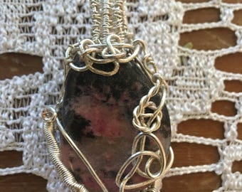 Wire wrapped , pink, black stone