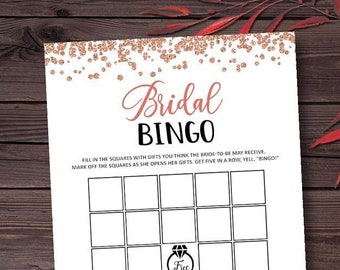 May include: A printable bridal shower bingo card with a rose gold glitter background. The card has a 5x5 grid with squares to fill in with gifts the bride-to-be may receive. The center square says "Free".
