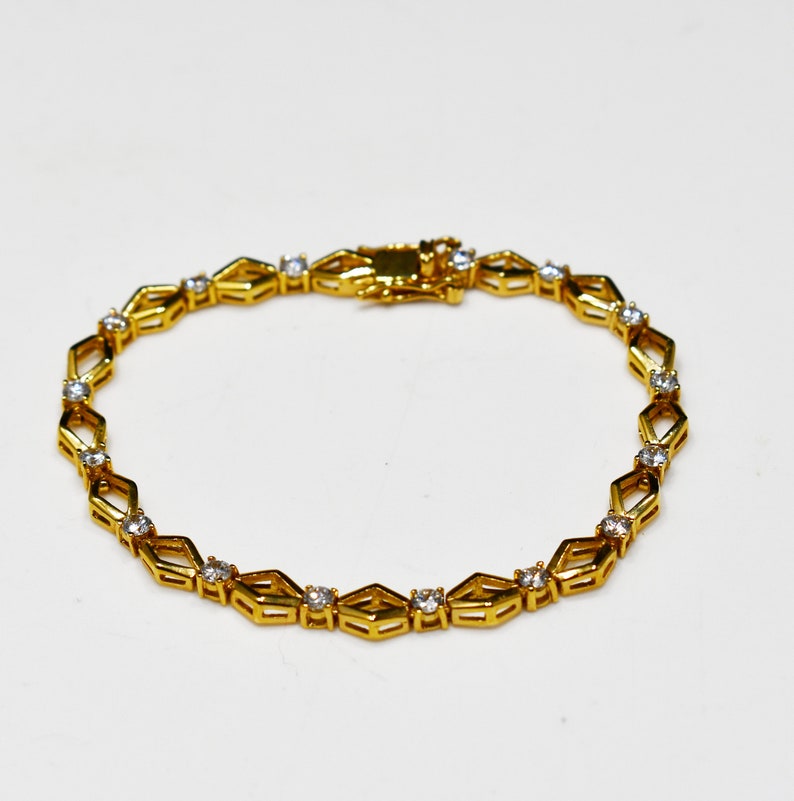 1970s Vintage Jewelry Gold Plated Clear Rhinestones Roman Vintage Tennis Bracelet