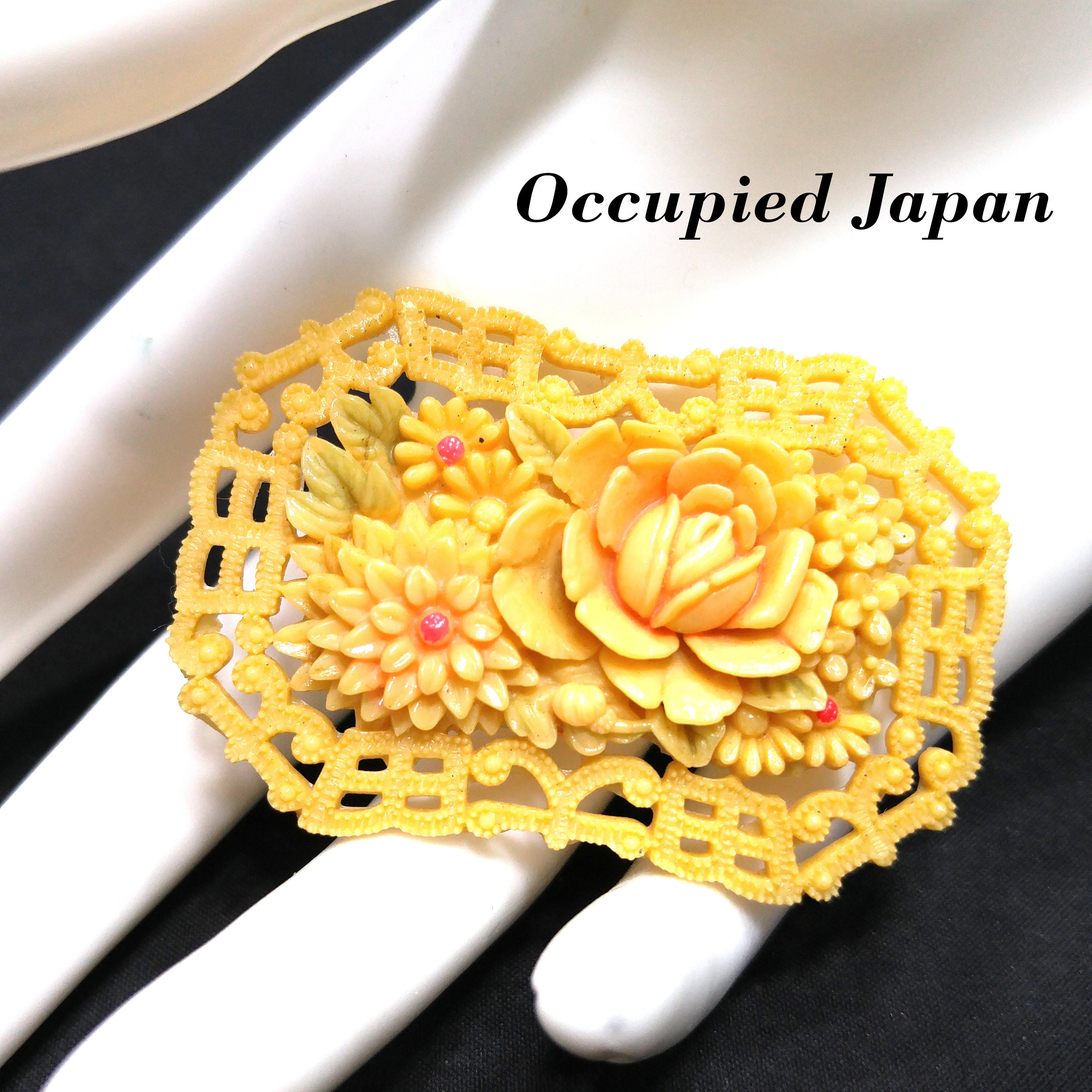 Celluloid brooch best sale