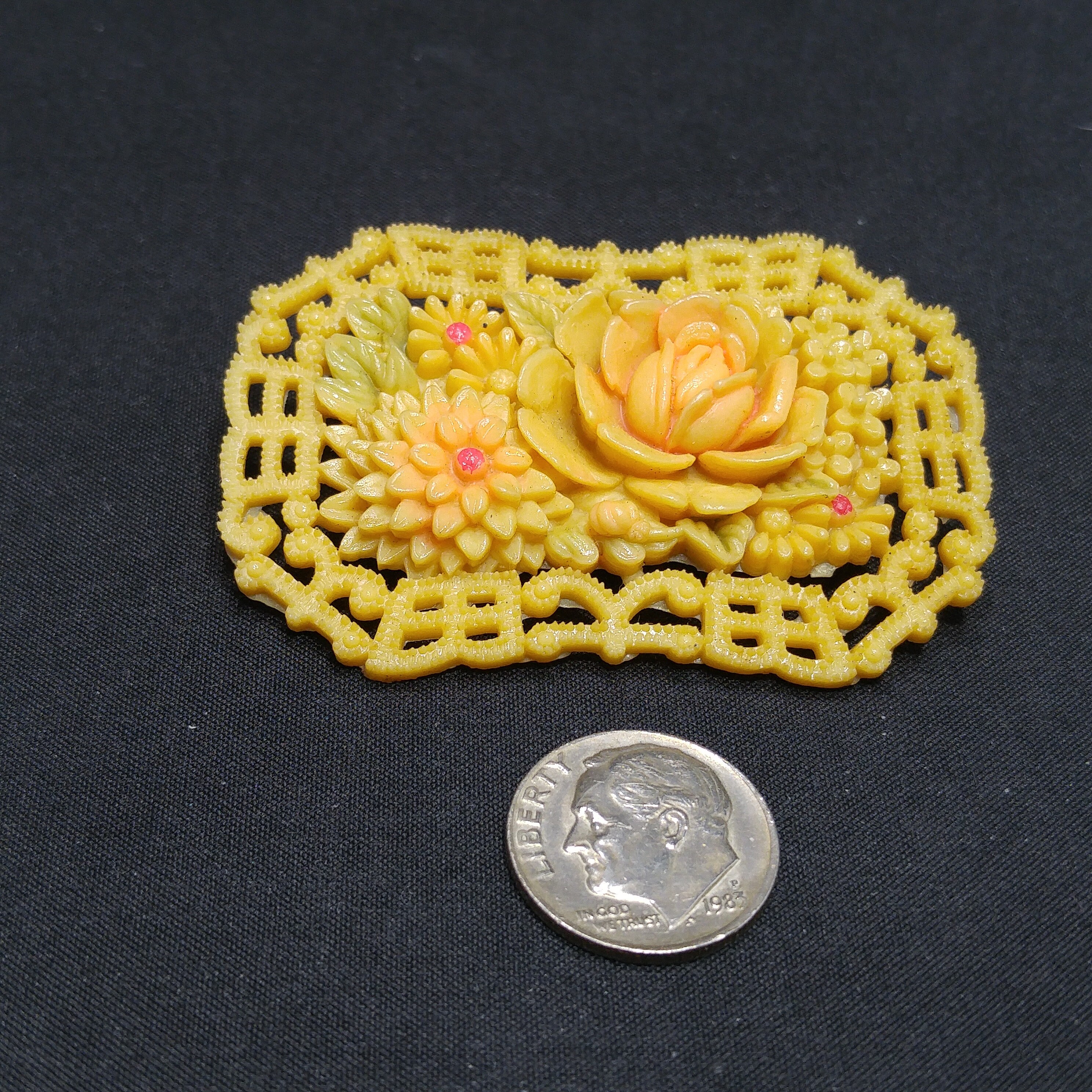 Celluloid brooch sale