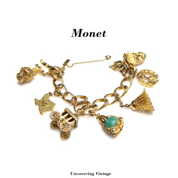 Monet Gold Plated Charm Bracelet 7 Monet Book Piece Spring Ring
