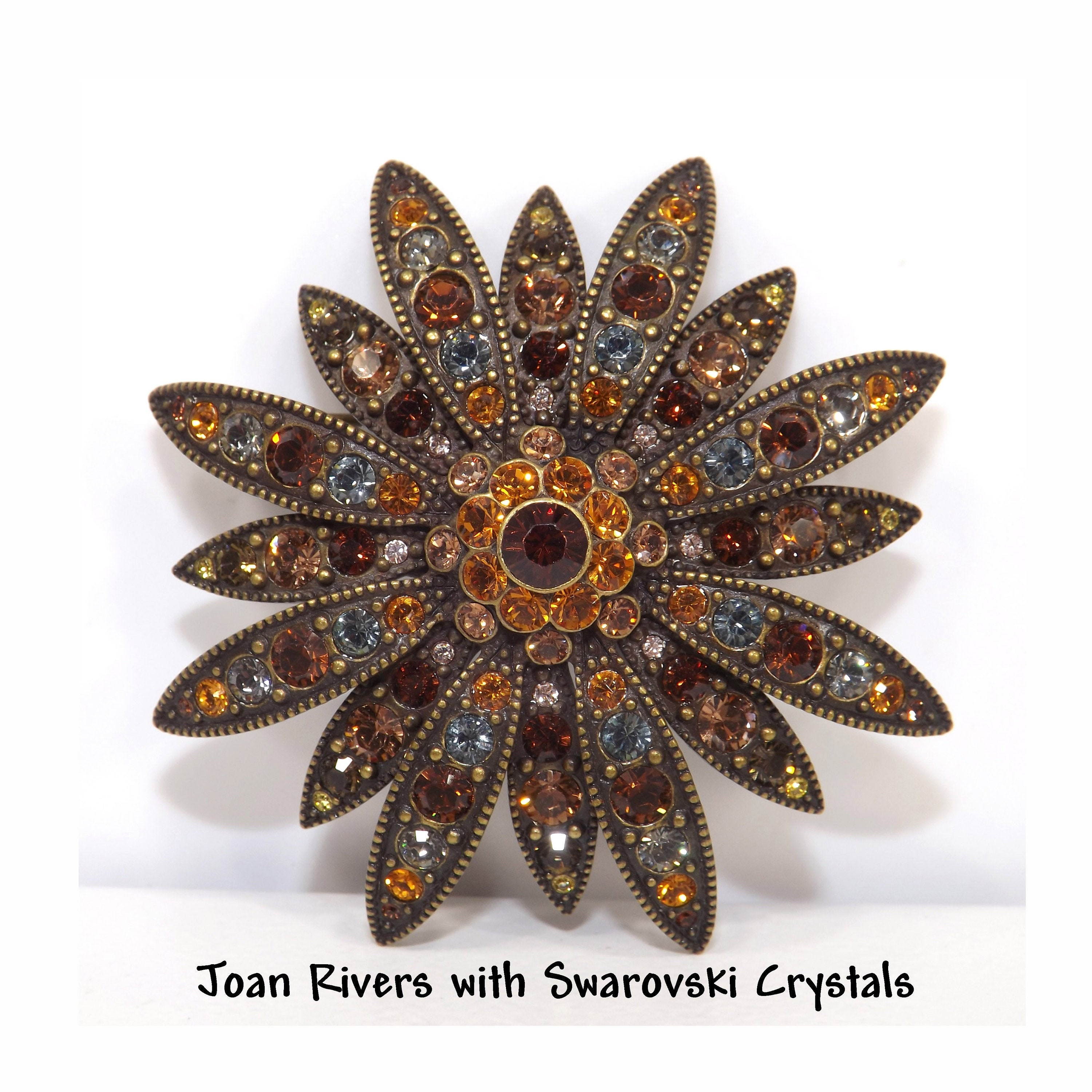 Joan rivers flower brooch deals