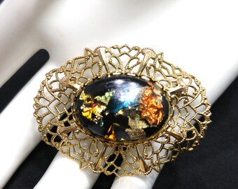 Lucite Gold Foil Filigree Brooch, Black Cabochon, 1960s Vintage Jewelry