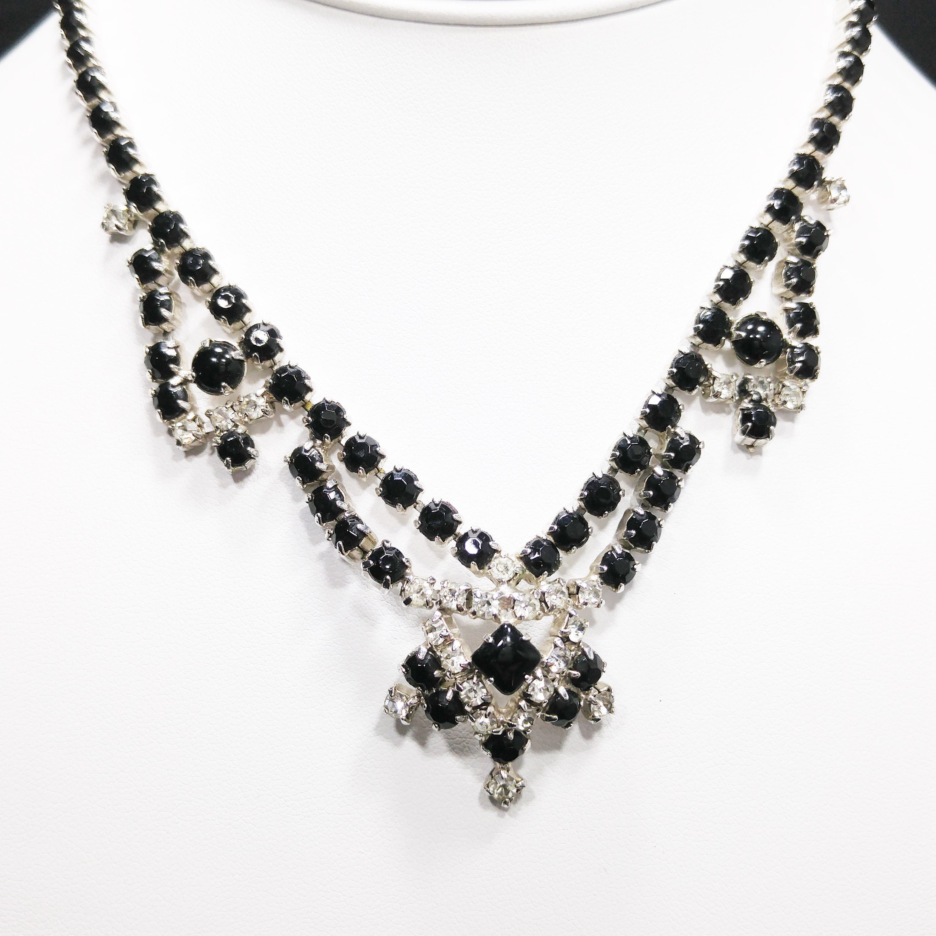 Lot - Miriam Haskell choker necklace with faceted black glass beads and  rhinestone rondelles with round central floral pendant and large c...
