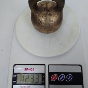 vintage weight for weighing,,metal brass,weight 3 pounds, antique