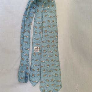 Vintage azure silk Hermes tie,Raccoon on Ice Floe made in France