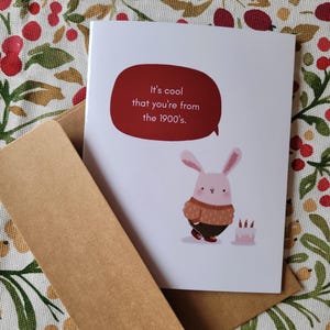 Carte d'anniversaire : adorable lapin des années 1900