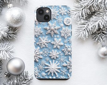 May include: A smartphone case featuring a light blue background covered in a repeating pattern of white, intricate, multi-pointed snowflake designs of varying sizes. The case has a cutout for a dual-lens camera system on the upper left side.