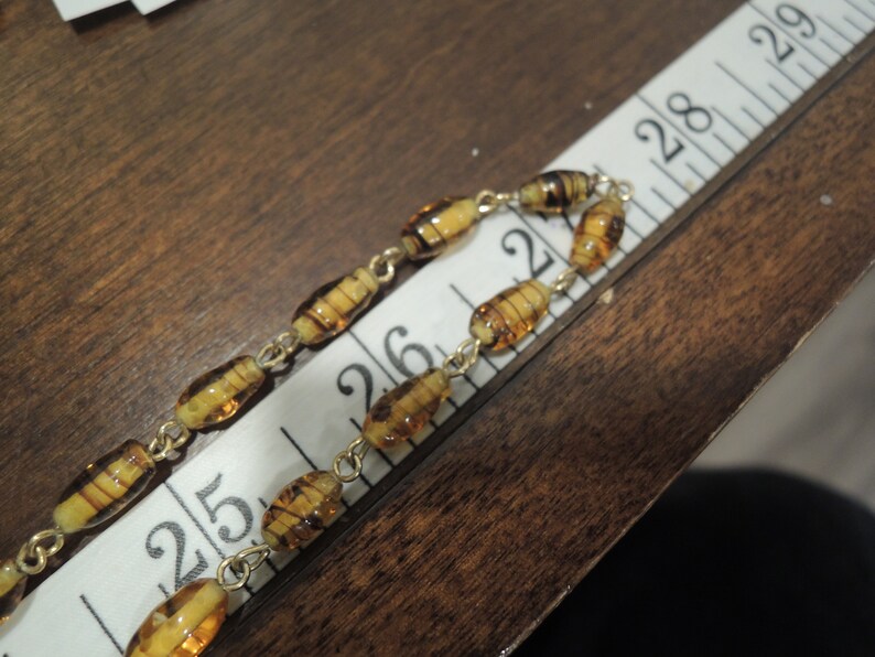 55 inch Amber Venetian glass Bead Necklace can be worn several ways