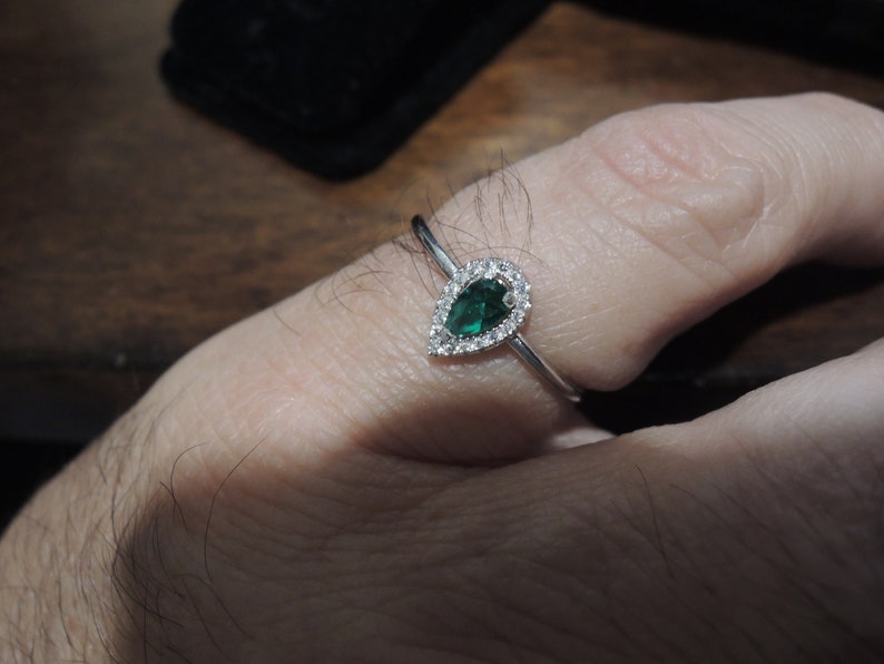 Sterling Halo Pear shaped ring Order in sterling white gold synthetic man-made gems or natural model is size 8