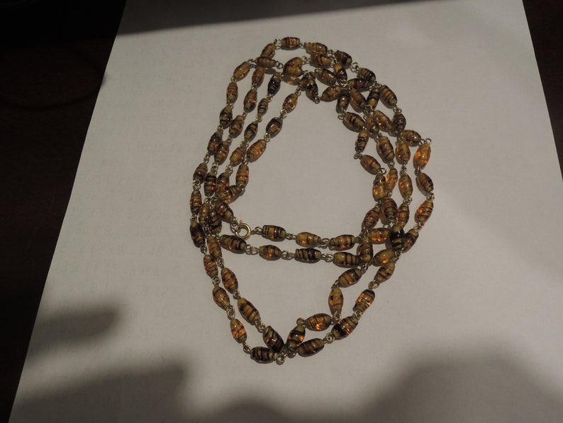 55 inch Amber Venetian glass Bead Necklace can be worn several ways