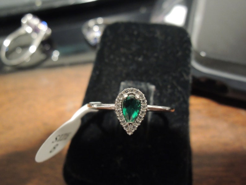 Sterling Halo Pear shaped ring Order in sterling white gold synthetic man-made gems or natural model is size 8