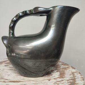 Zoomorphic jug vase, black enameled ceramic bird-shaped, France, 50s