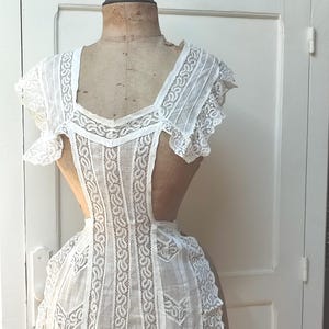 Long white lace and tiered apron