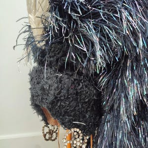 Cabaret show girl coiffe with long ostrich plume