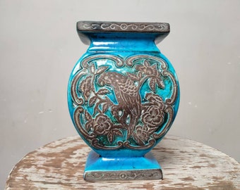 Blue ceramic vase with parrot and floral pattern, vintage urne