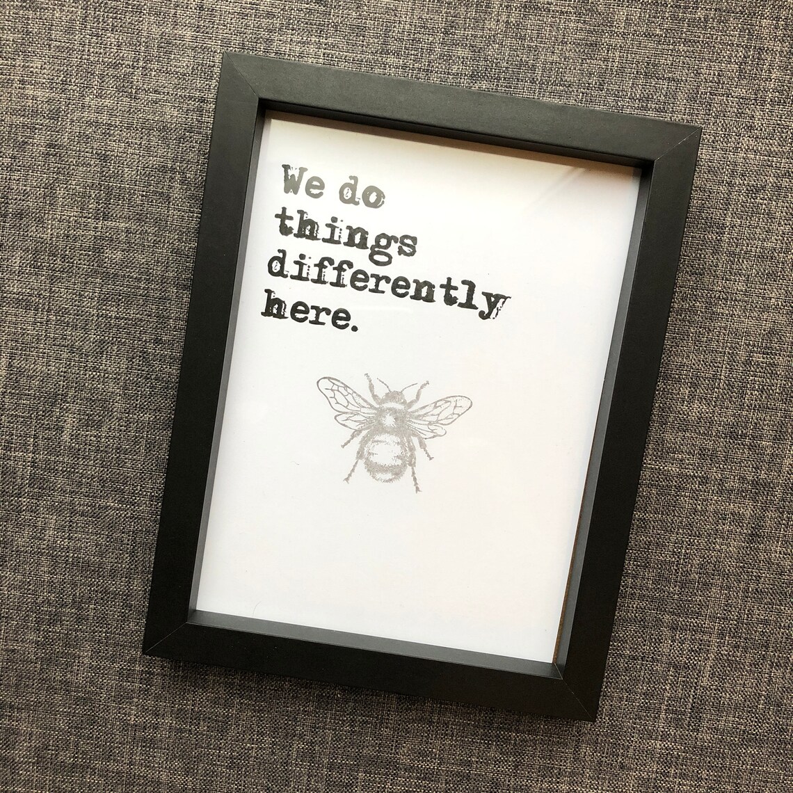 A5 impression de citation encadrée Cest Manchester. Nous