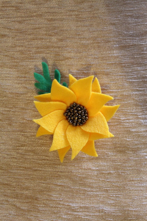 Lovely little handcrafted yellow fabric flower brooch with small daisy centre
