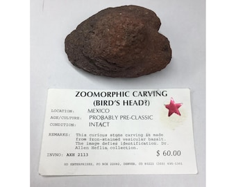 Artefacto antiguo precolombino tallado en piedra basáltica con forma de ave ZOOMÓRFICA PRECLÁSICO