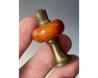 Antiek - vintage art-deco kruisbloem van oranje bakeliet en messing uit het midden van de eeuw