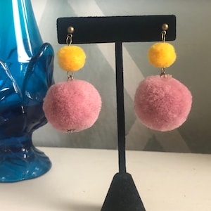 Handmade antiqued brass pink and yellow pom pom earrings