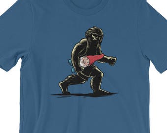 Sasquatch Carrying Garden Gnome, Short-Sleeve Unisex T-Shirt, Funny Gnome Tee, Bigfoot, Sasquat, Squatch