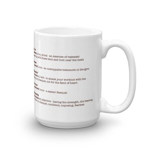 May include: White ceramic mug with a brown text definition of the word "Sasquatch". The definition includes the words "exercise", "unstoppable", "attack", "workout", "sassier", "strength", "bearing", "confident", "imposing", and "fearless".