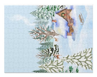 May include: A jigsaw puzzle featuring a winter scene with a snow-covered cabin, evergreen trees, and a sled. The watercolor illustration has a light blue sky background and a cozy, festive theme. The puzzle is composed of many small pieces.