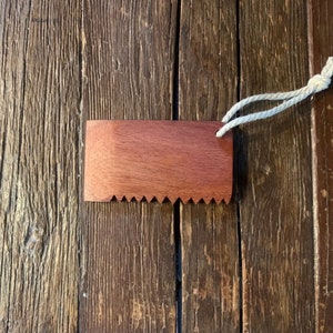 Handmade hardwood surf wax comb.Hemp lanyard and natural oil finish.Shark bite Teeth.