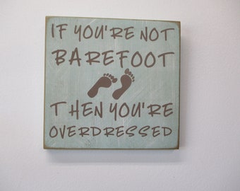 If you're not barefoot, then you're overdressed Wooden Beach Sign.