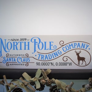 North Pole Trading Company Wood Sign – Santa Claus Approved – 7.25” x 20” - Christmas Decor, Santa Signs