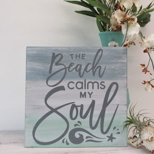 The Beach Calms My Soul Wood Sign –Coastal Wall Décor – Hand-Painted Beach Quote – Ocean-Inspired Rustic Sign – Beach Lover Gift