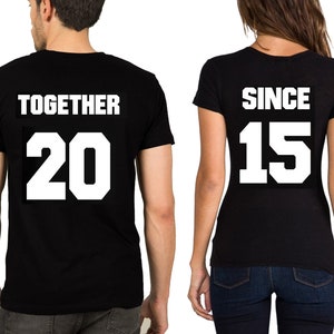 May include: Two black t-shirts with white text. The first shirt says "Together 20" and the second shirt says "Since 15".