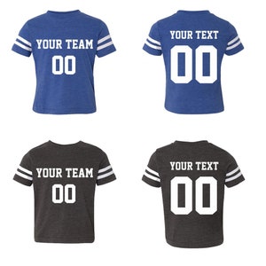 May include: Two youth-sized football jerseys, one blue and one gray, with white stripes on the sleeves. Both jerseys have the text "YOUR TEAM" and the number "00" printed on the front. The back of the jerseys have the text "YOUR TEXT" and the number "00" printed on the back.