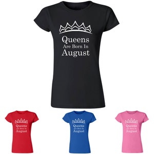 May include: A black, blue, pink, and red t-shirt with a white crown and the text "Queens Are Born In August".