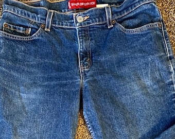 Jeans Levi's 518 Boot Cut vintage: mezclilla elástica, cremallera, etiqueta roja, (31x27) Boho