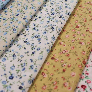 PRINTED POLYCOTTON FABRIC MIXED FLOWER DESIGN