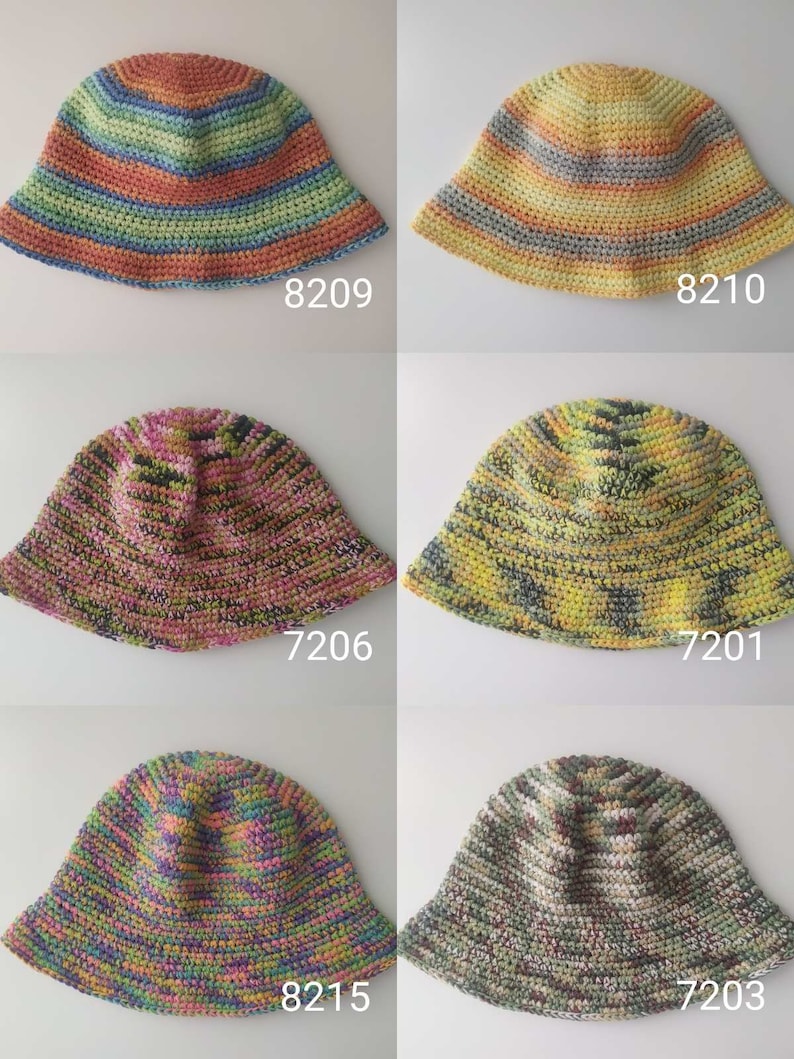 May include: Six crocheted bucket hats in various color combinations, including yellow, green, orange, pink, and blue. The hats are all made with a striped pattern.