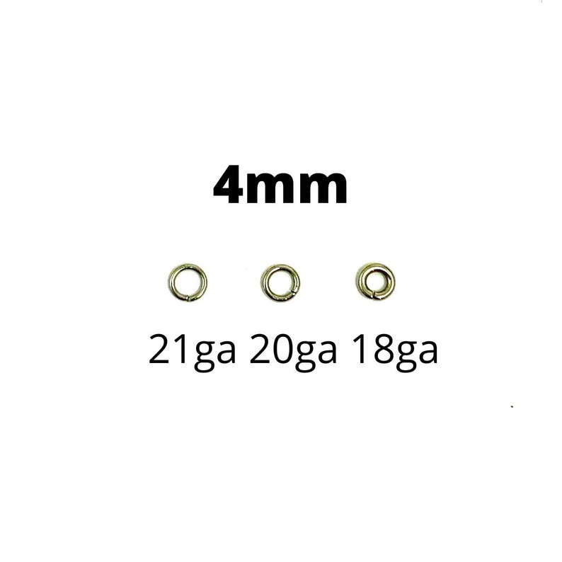 May include: Three small, silver-colored jump rings are displayed on a white background. The text "4mm" is above the rings, and below them are the text "21ga 20ga 18ga".