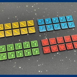 May include: A collection of square game tokens in four colors: yellow, blue, green, and red. Each token features a unique icon, such as an exclamation point, a flag, a creature, or a heart. The tokens are arranged in neat rows.