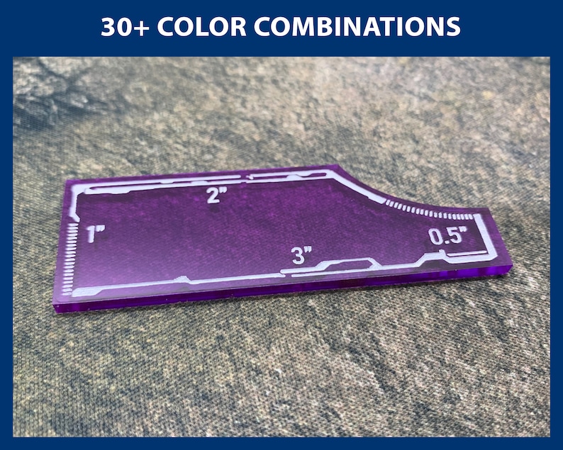 Peut inclure: Un gabarit en plastique violet avec des marques blanches pour l'artisanat. Le gabarit mesure 7,6 cm de long, 5,1 cm de large et a une courbe de 1,3 cm.