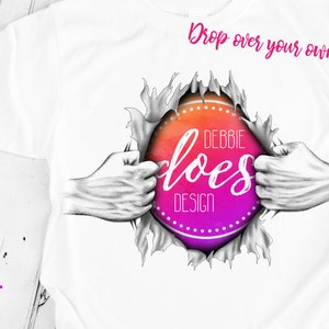 May include: A white t-shirt with a ripped design revealing a pink and orange watercolor circle with the text "DEBBIE does DESIGN" in white. The text "Drop over your own image!" is written in black at the top of the image.