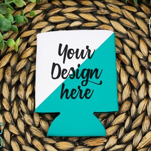 May include: A white and teal can cooler with the text "Your Design Here" in black. The cooler is sitting on a woven wicker surface.