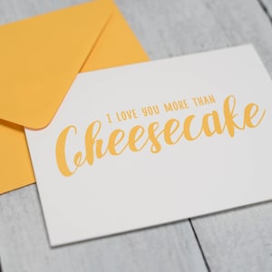 Cartolina d'auguri di "Ti amo più di CHEESECAKE" | Giorno di San Valentino | Fidanzati | Anniversario | Giorno del matrimonio